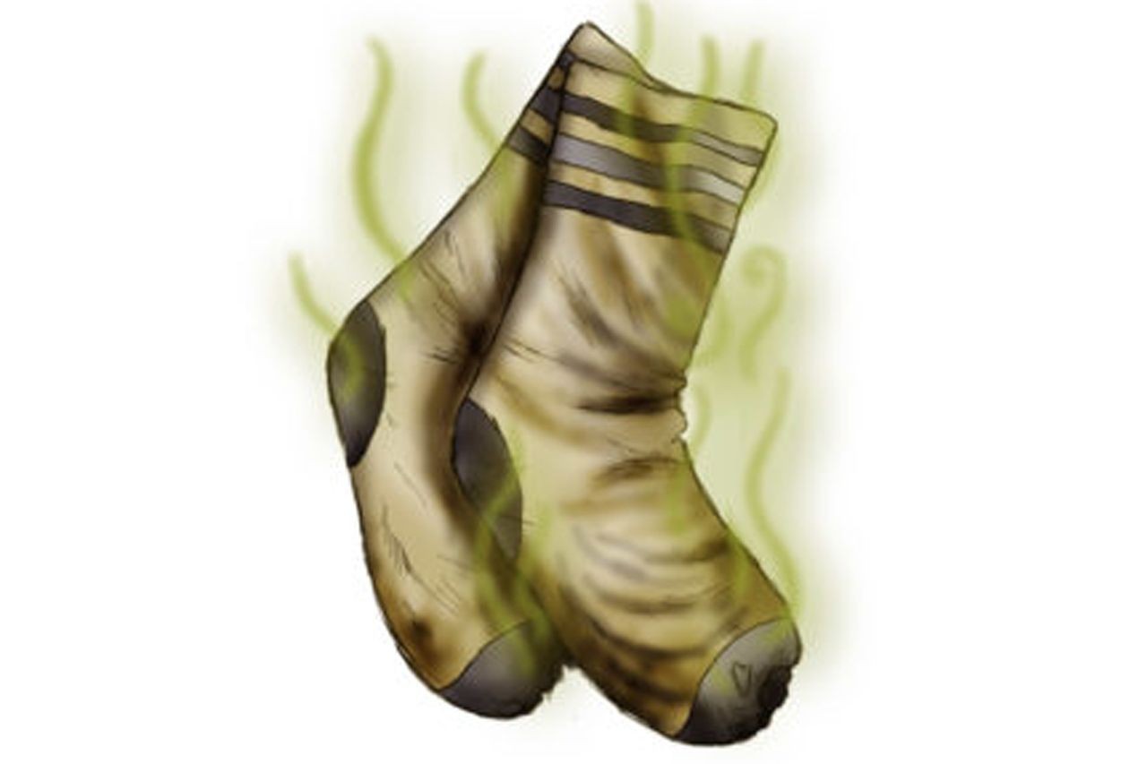 Green smoke coming off of dirty socks