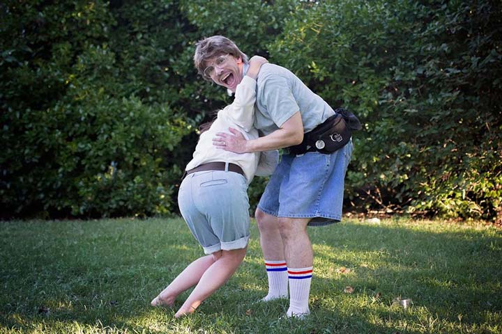 Tennille and Adam Melcher laughing hysterically during their 80s photoshoot